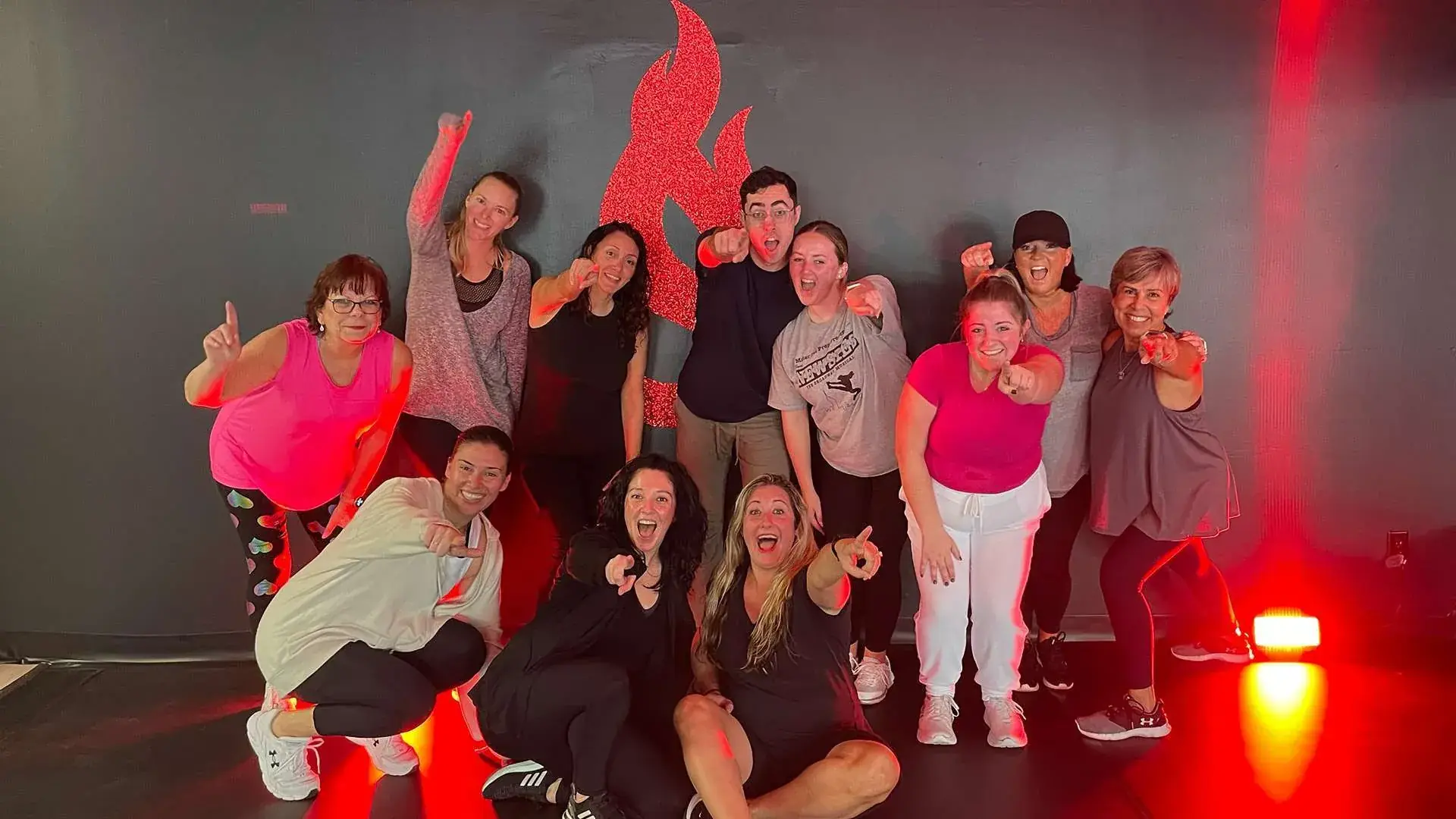 Dancers posing in bright light after a Saucy Studios class